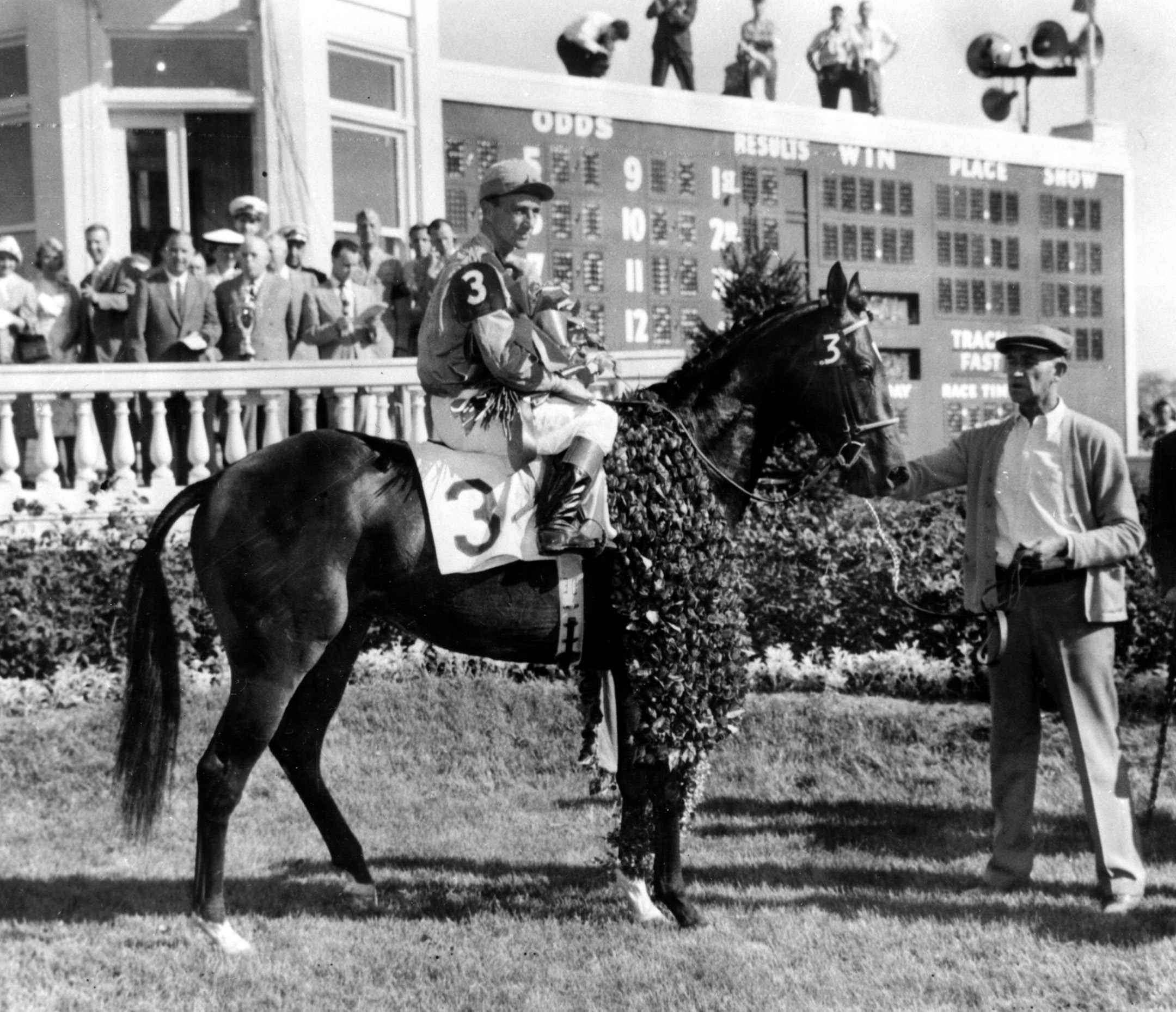 Needles (Dave Erb up) in the winner's circle for the 1956 Kentucky Derby (Keeneland Library Morgan Collection/Museum Collection)