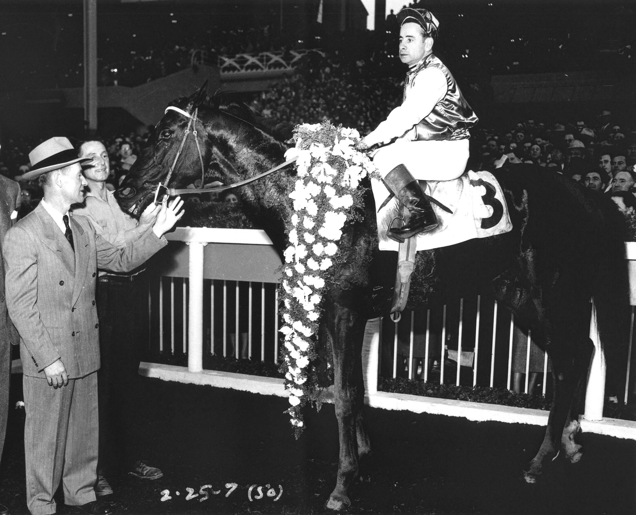 Noor (Johnny Longden up) in the winner's circle for the 1950 Santa Anita Handicap (Bill Mochon/Museum Collection)