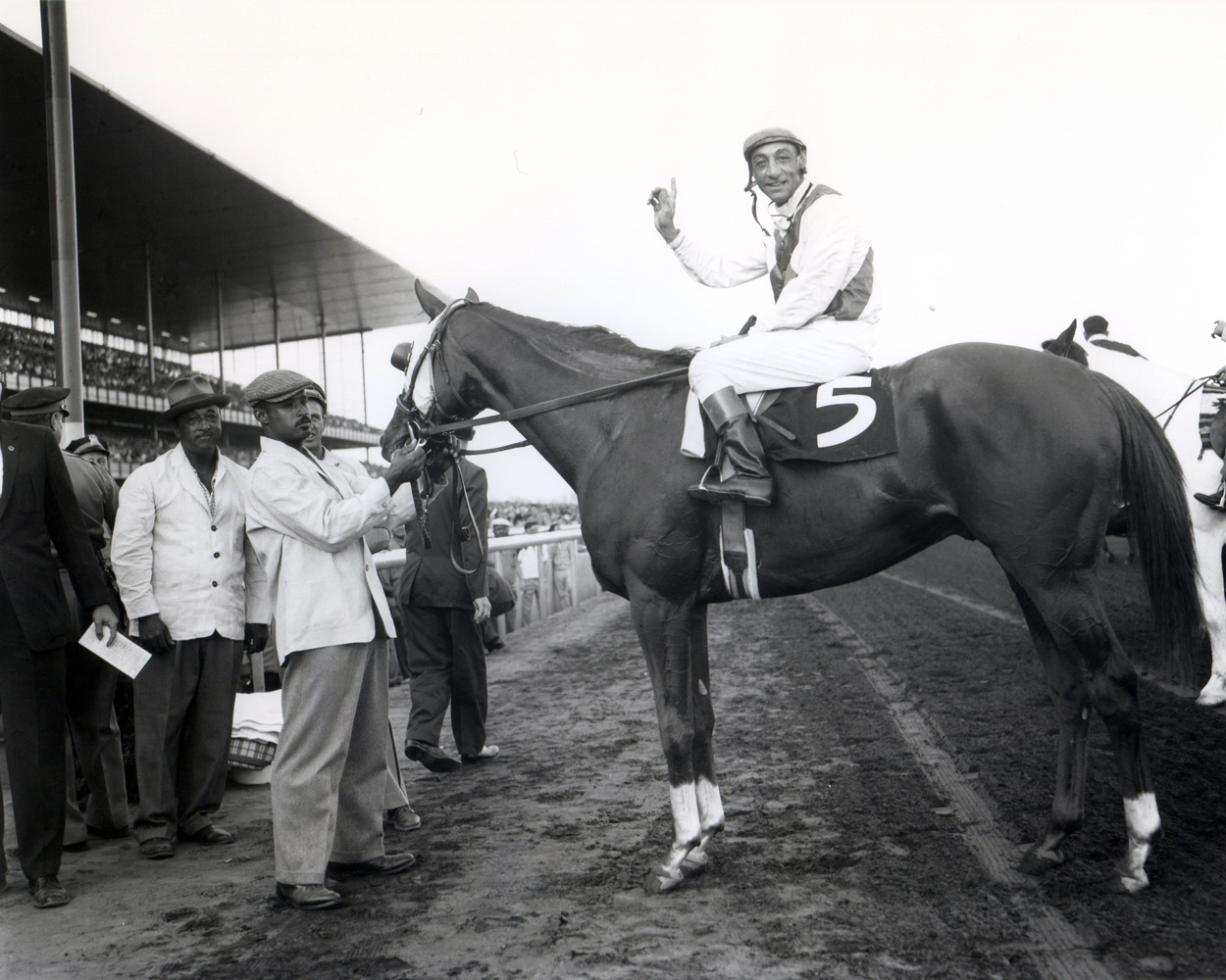 Sword Dancer (Eddie Arcaro up) in the winner's circle for the 1959 Woodward (Keeneland Library Morgan Collection/Museum Collection)