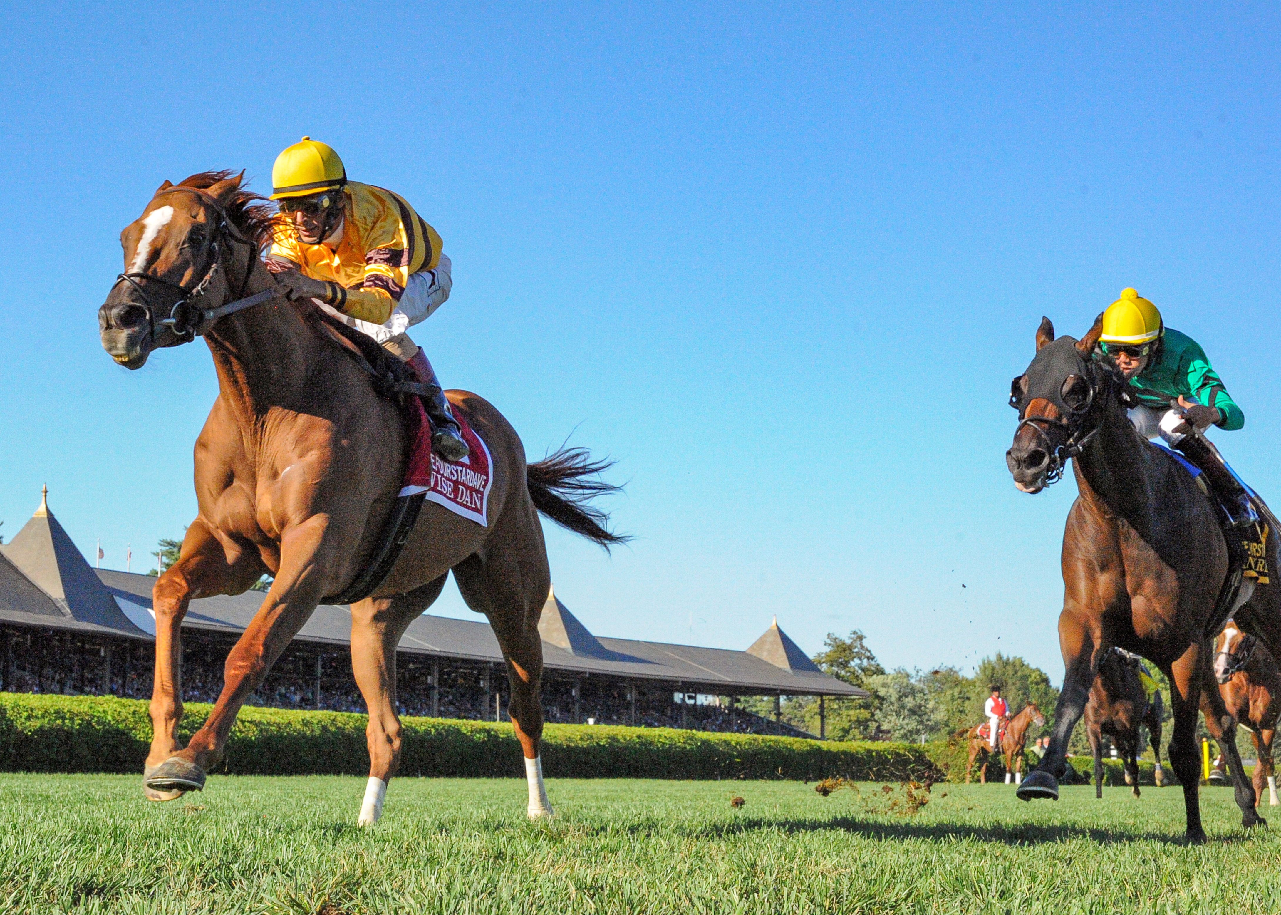 Wise Dan (John Velazquez up) winning the 2013 Fourstardave at Saratoga, his second consecutive win in this stakes race (Bob Mayberger)