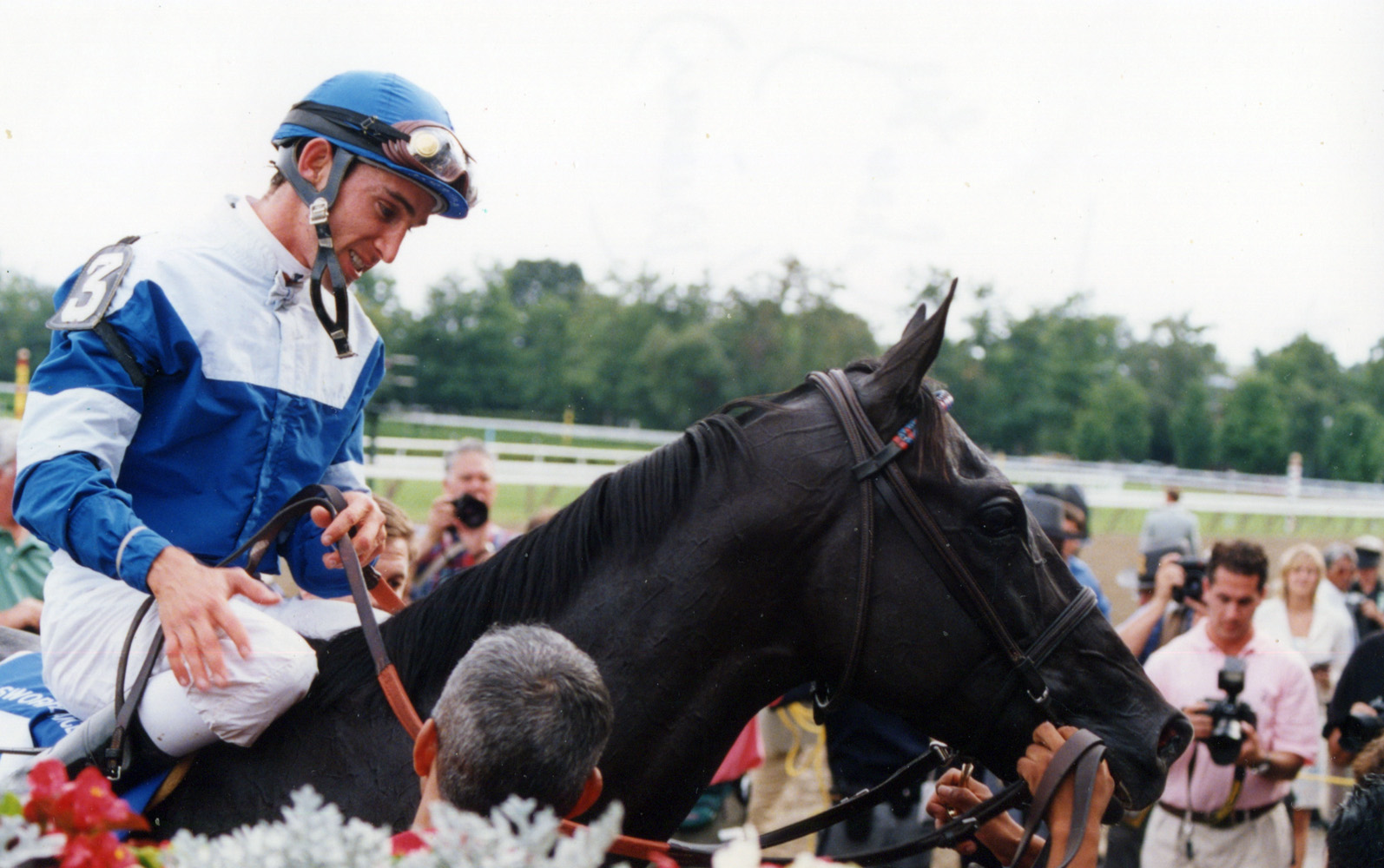 Ramon Dominguez in the winner's circle for the 2004 Sword Dancer at Saratoga (Mike Pender/Museum Collection)