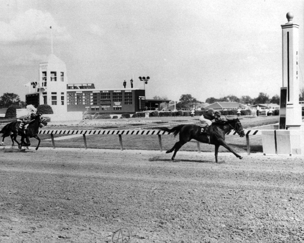 Manny Ycaza and Dark Mirage win the 1968 Kentucky Oaks at Churchill Downs (Bob Coglianese/Museum Collection)