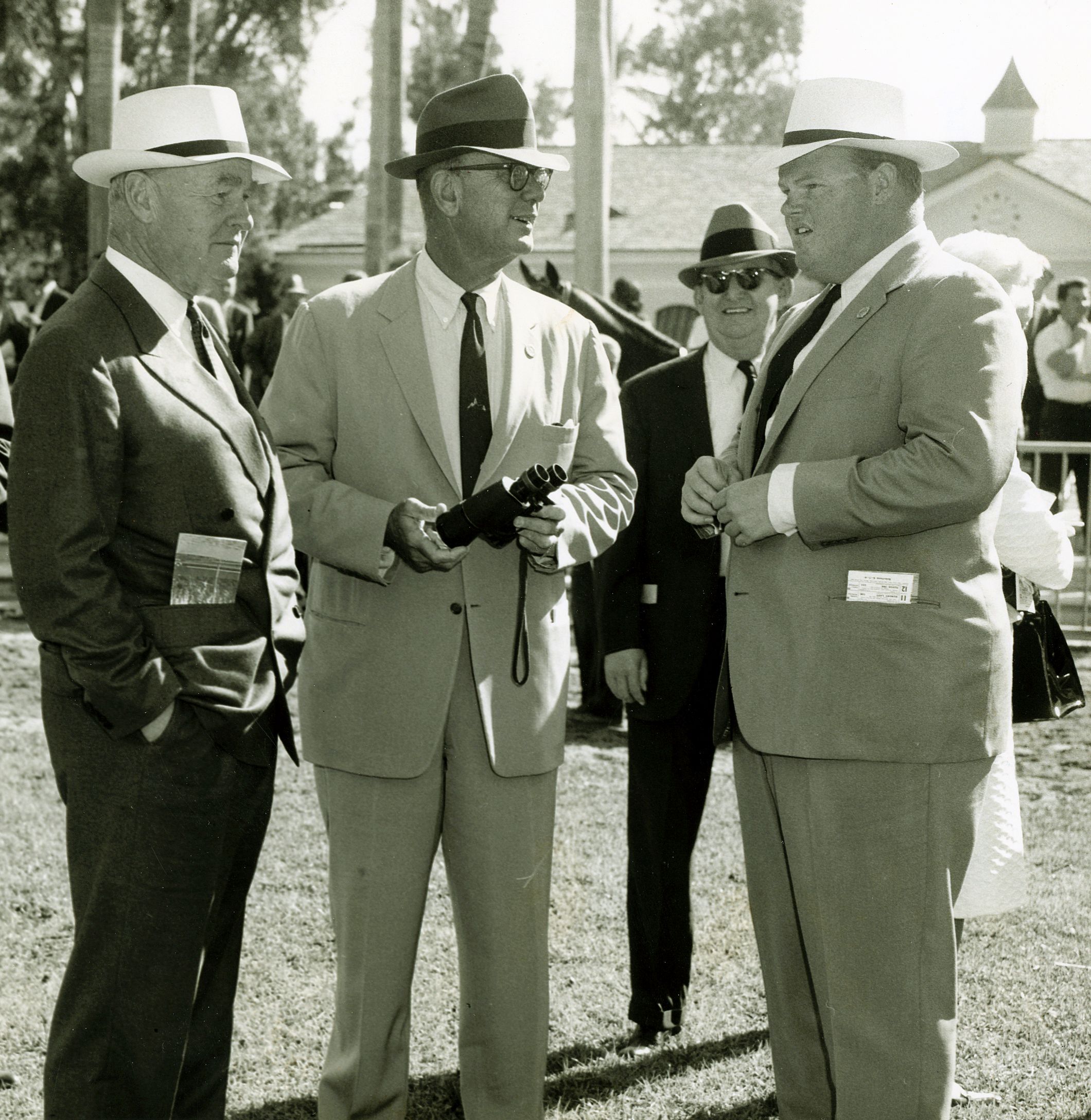 Ogden Phipps, Bull Hancock, and Dinny Phipps in the paddock in 1966 (Keeneland Library Thoroughbred Times Collection)