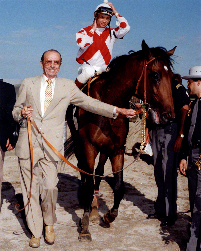 Woody Stephens leading in Danzig Connection (Pat Day up) to the winner's circle after winning a race (Bob Coglianese/Museum Collection)